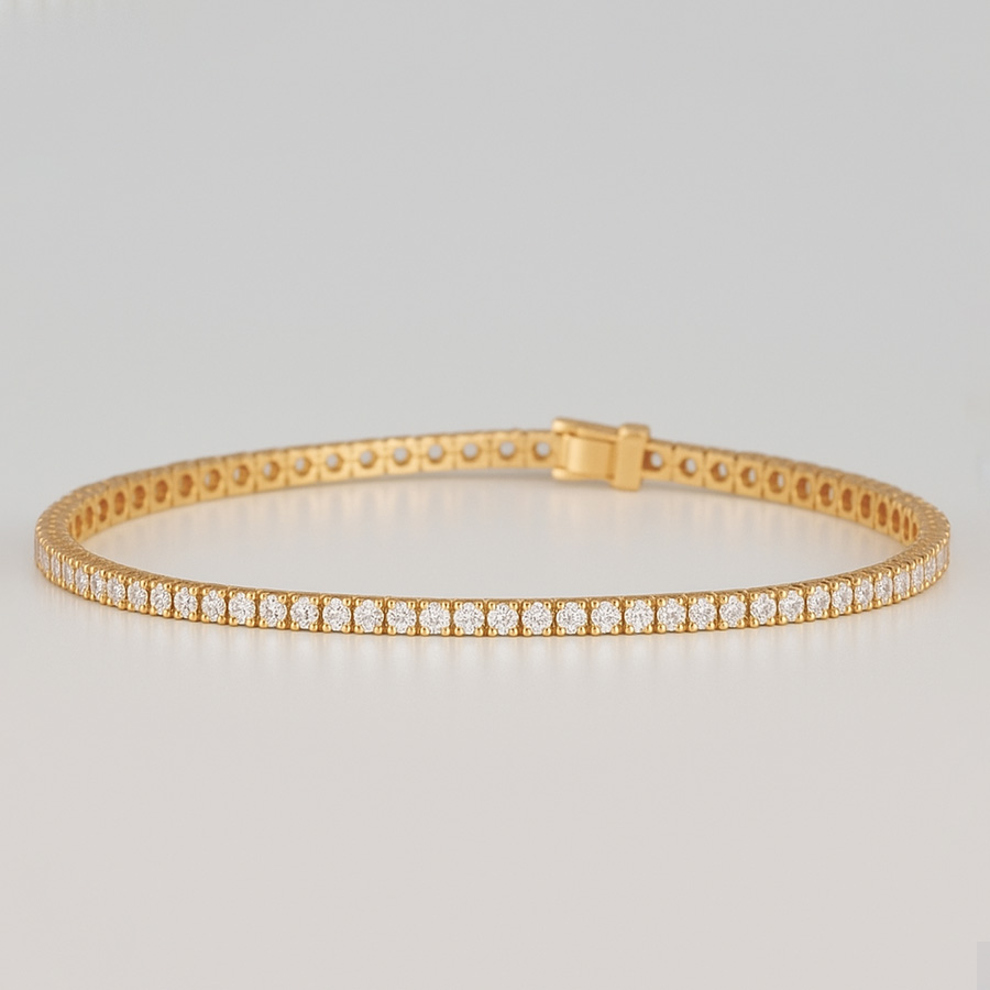 14K Yellow Gold Tennis Bracelet set with 4 Carat Round Lab
